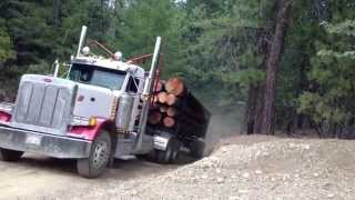 Two log trucks coming over a hill [upl. by Grewitz743]