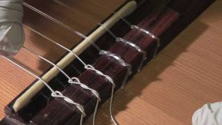 How to restring a classical guitar [upl. by Ilocin688]